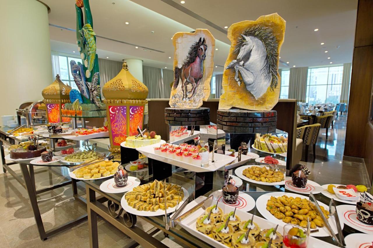 Holiday Suites Al Aziziah Mekka Buitenkant foto A buffet at the Jumeirah Jumeirah Hotel