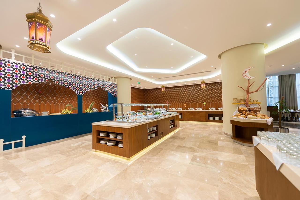 Holiday Suites Al Aziziah Mekka Buitenkant foto The hotel's restaurant