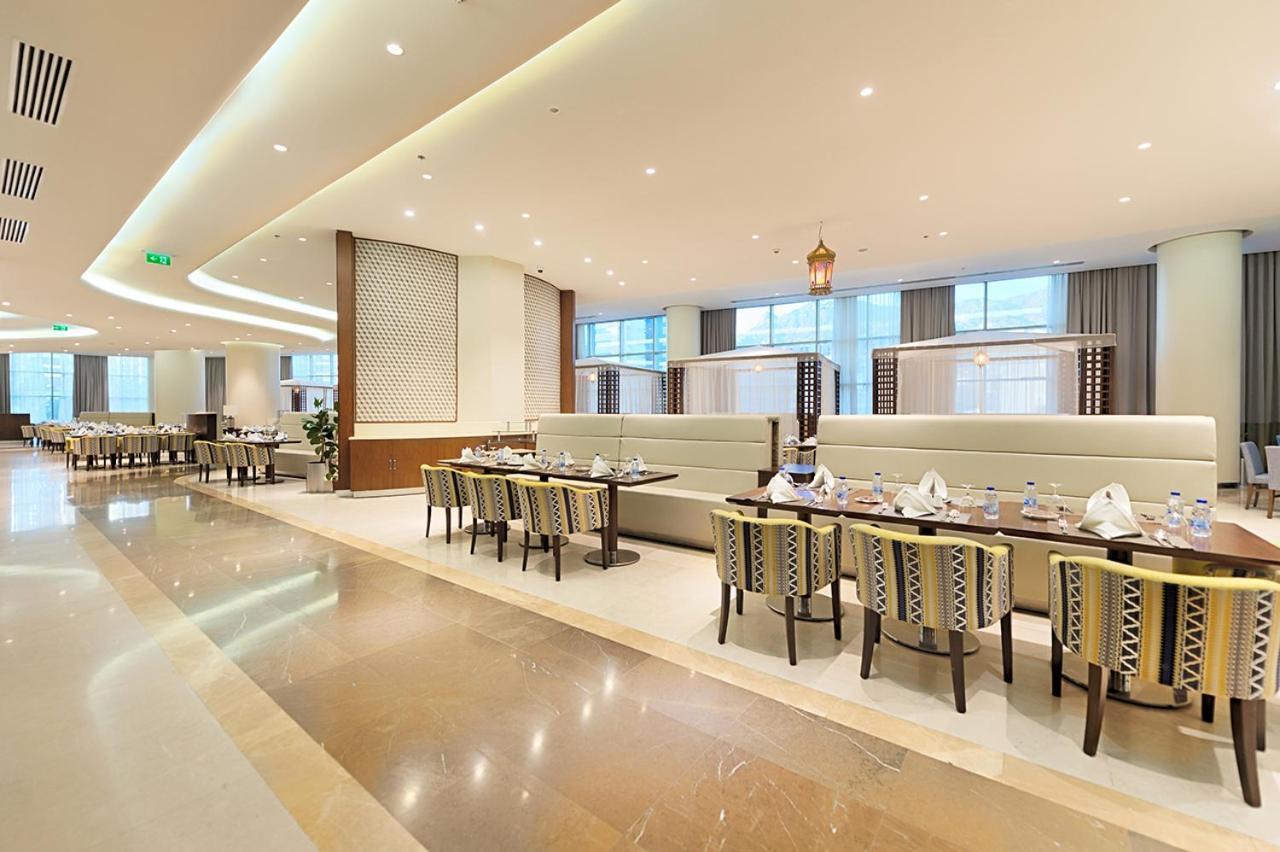 Holiday Suites Al Aziziah Mekka Buitenkant foto The hotel's restaurant