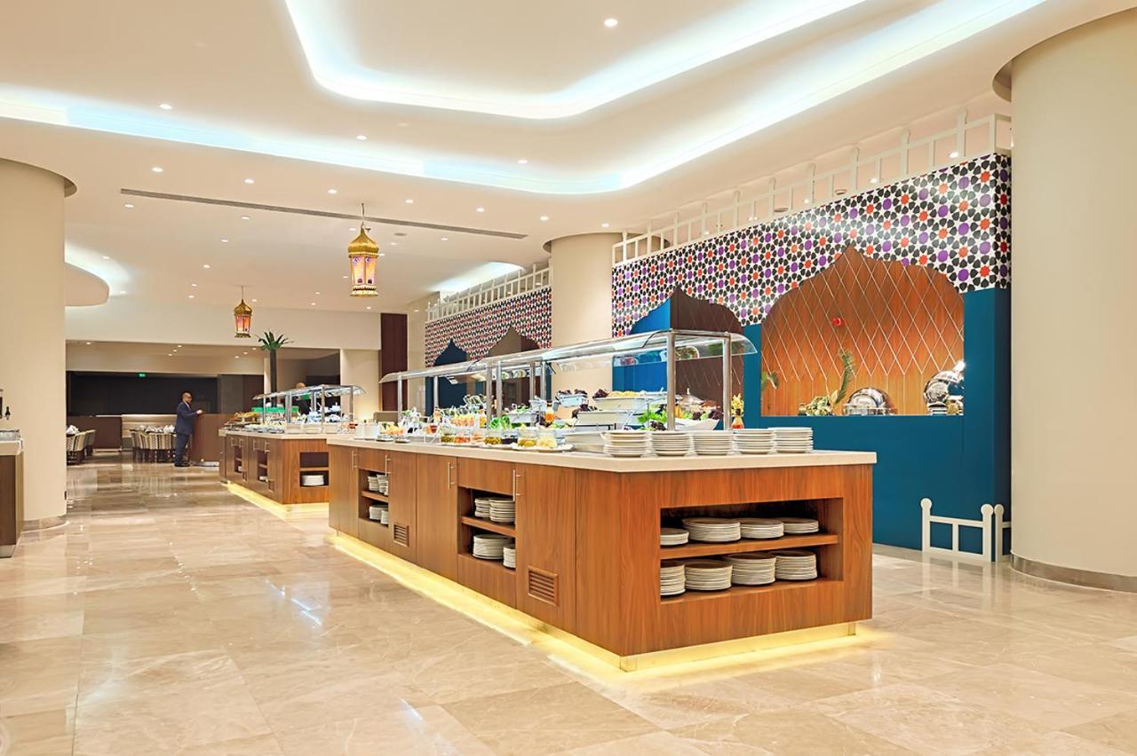 Holiday Suites Al Aziziah Mekka Buitenkant foto The hotel's restaurant